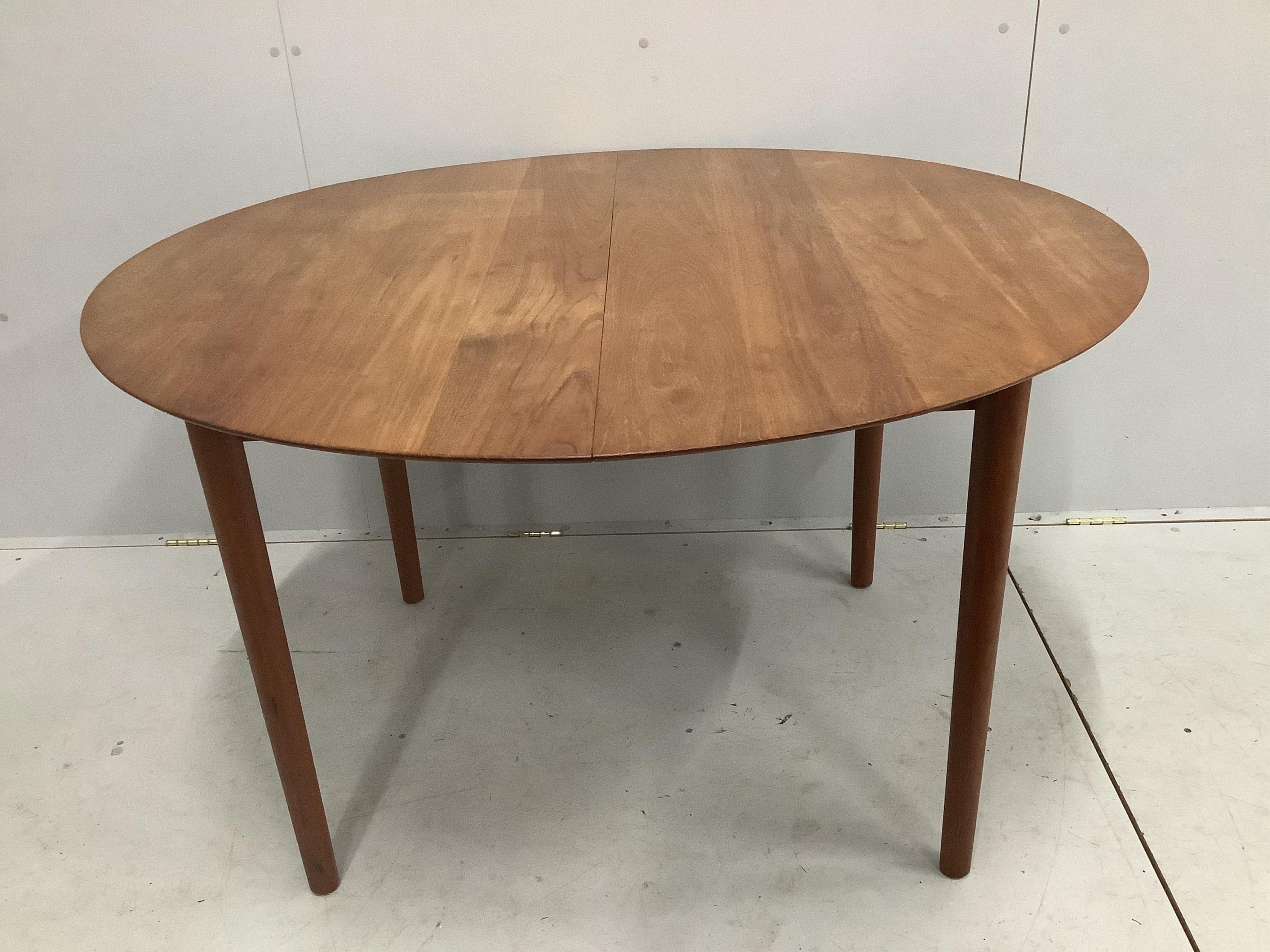 Niels Otto Moller. A Danish teak dining table, width approx. 180cm extended, depth 115cm, height 73cm together with six chairs. Condition - fair